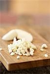 Chopped garlic on chopping board