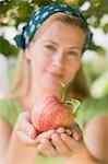 Woman holding an apple