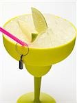 Frozen Margarita with lime wedges