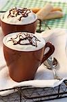 Hot chocolate with cream topping and chocolate decoration