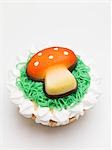 Cupcake with fly agaric mushroom for New Year's Eve