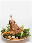 Lamb shank with quails' eggs, carrots and parsley for Easter