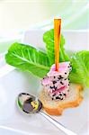 Tuna with sesame seeds and bread on skewer