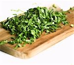 Shredded parsley on chopping board