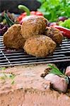 Meatballs on a barbecue