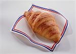 Fresh croissant on a napkin