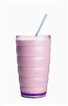 Fruit Smoothie in a Glass with a Straw; White Background
