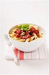 Penne with tomato sauce and basil