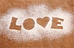 The word 'LOVE' in icing sugar