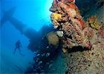 Scuba diver on shipwreck.