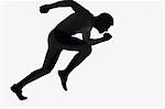 Silhouette of a male athlete running