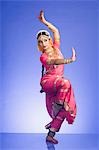 Woman performing Pataka mudra of Bharatnatyam