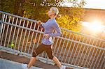 Woman Running at Sunset, Seattle, Washington, USA