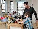 Son Helping Father in Kitchen