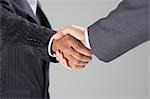 Businessmen Shaking Hands, mid-section