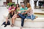 Group of tourists by fountain