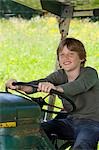 Boy on truck, proud