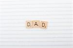 Game tile letters spelling dad