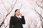 Businesswoman Interacting on Cell Phone