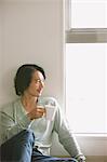 Man Drinking A Cup Of Coffee