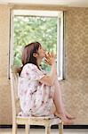 Japanese Woman Sitting On A Chair