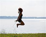 Girl jumping with rope