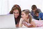 Mother and daughter on laptop