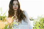 Woman Standing in Long Grass