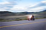 Biker on Road Near Oliver, British Columbia, Canada