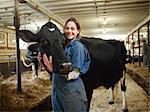 Portrait of Farmer with Cow, Ontario, Canada