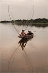 Teenage Boy Fishing on Tha Chin River, Nakhon Chai Si, Nakhon Pathom Province, Thailand