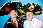 portrait of two men wearing sombreros