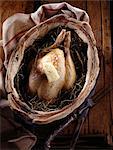 Chicken baked with hay