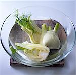 Raw fennel in a bowl of water