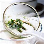 Herb salad dressing in bowl