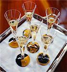 Glasses of champagne on a tray