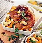 Leg of lamb with garlic and vegetables