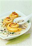 Rolled scorpion fish fillets with shiitakes and cream sauce