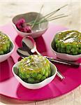 small terrines of peas and curry