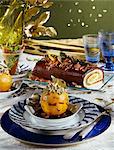 Caramelized peach with crushed pistachios and hazelnuts,chocolate and peach log cake