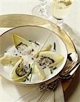 Hot oysters with chicory and truffles