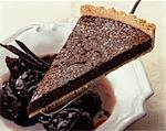 Chocolate tart with stewed prunes