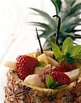 Fruit salad served in a pineapple