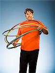 Man With Hula Hoops Looking Confused