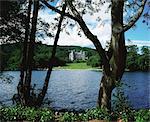 Castlewellan Forest Park, Castlewellan, County Down, Ireland; Lake And Park Scenic With Castle In Background