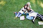 Group of Friends Sitting on Grass