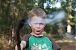 Little Boy Holding a Smoking Stick, Richards, Grimes County, Texas, USA