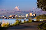 View of Anchorage skyline at sunset from the Tony Knowles Coastal Trail, Anchorage, Southcentral Alaska, Fall