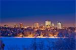 Skyline view of downtown Anchorage and Westchester Lagoon at twilight, Southcentral Alaska, Winter