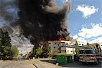 Anchorage Fire Department Station Five responds to a massive fire in the North Building of the Park Place Condominiums in Downtown, Anchorage, Southcentral Alaska, Summer